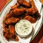 Glazed buffalo wings with herbs, served with creamy dill dipping sauce.