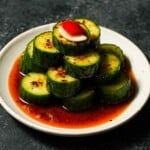 Din Tai Fung cucumber copycat salad piled on a small plate.