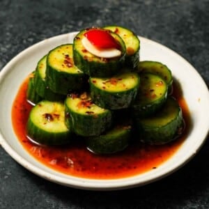 Din Tai Fung cucumber copycat salad piled on a small plate.