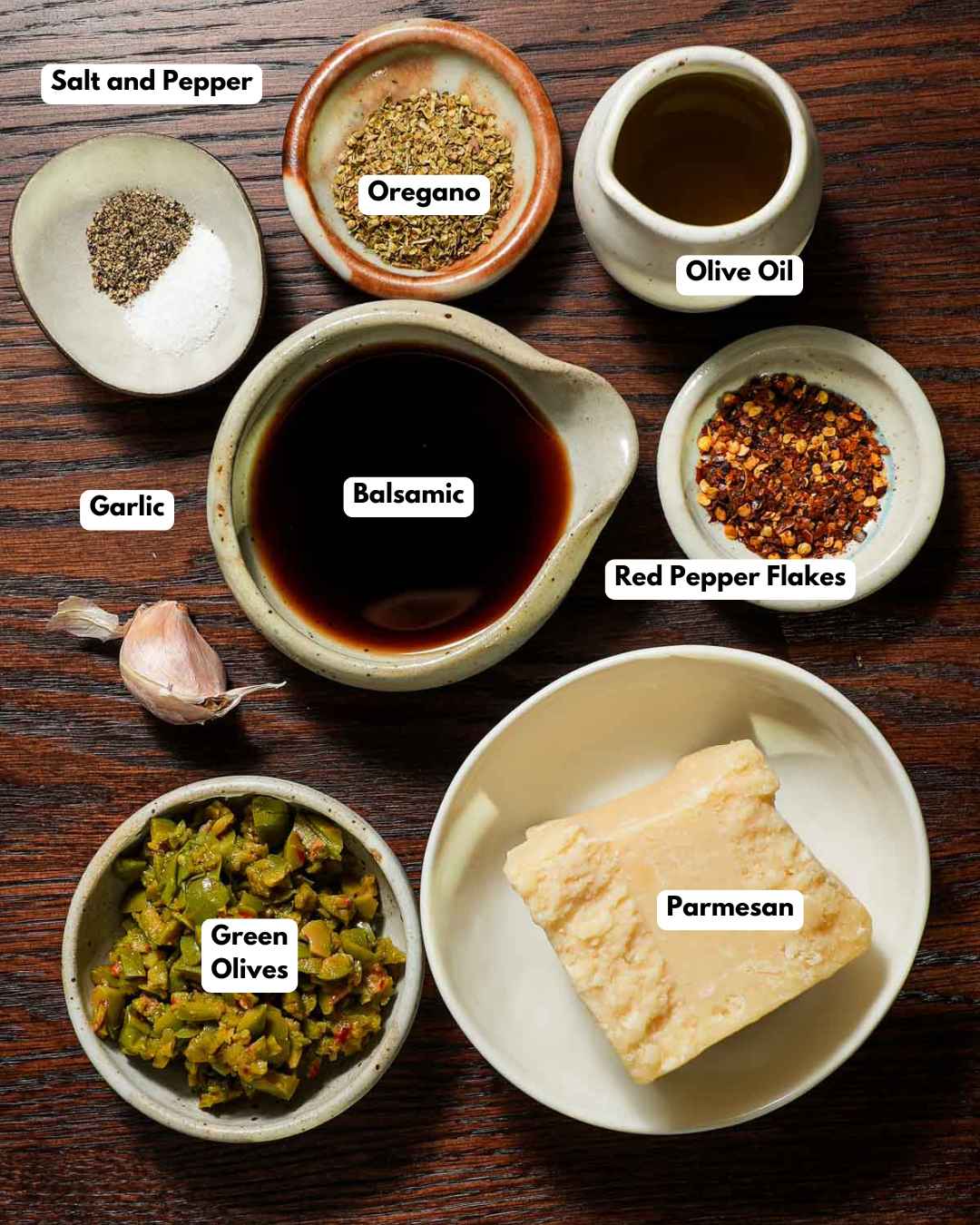 The ingredients to make bread dipping oil.