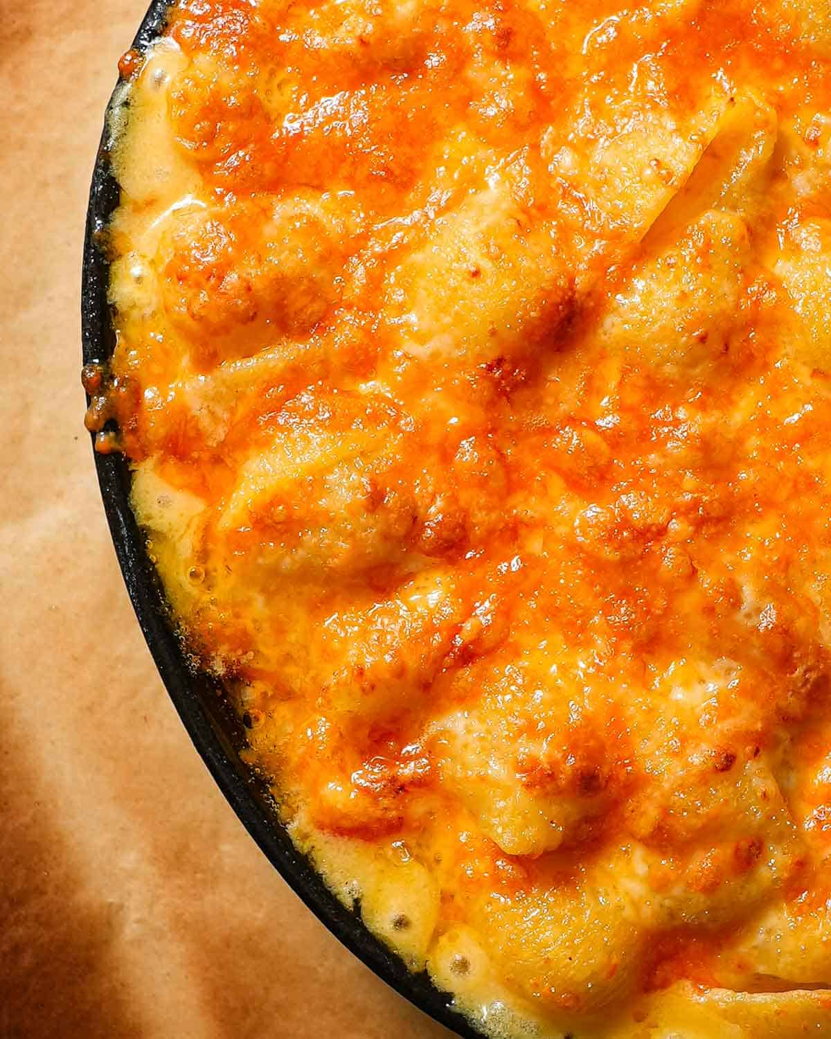 Baking dish of baked mac and cheese with butternut squash.